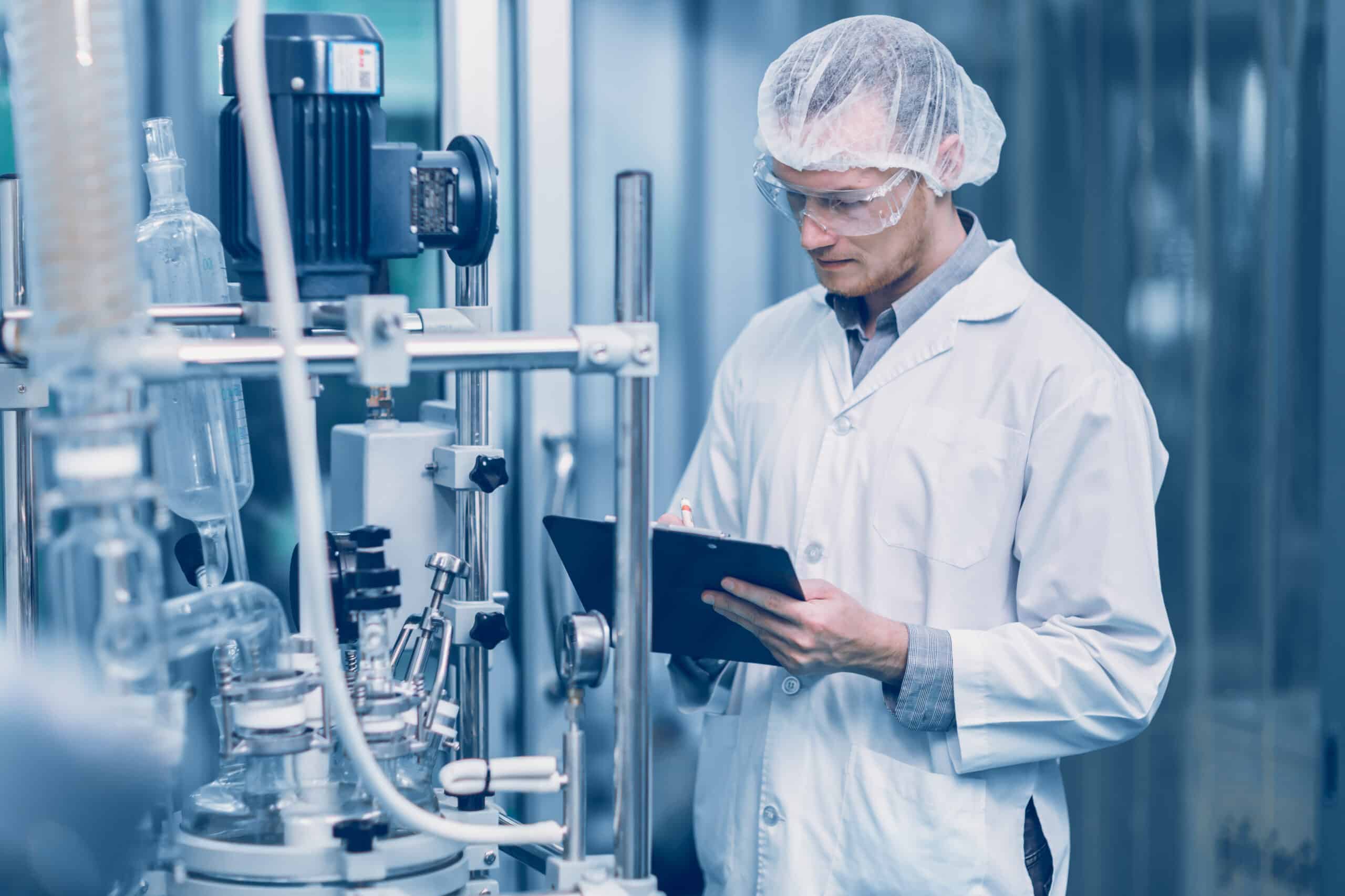 Medicine Factory Scientist Worker Work In Laboratory Plants Process. Medical Doctor Working Research In Pharmaceutical Industry.